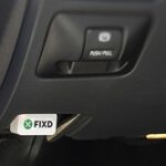 Fixd adapter plugged into OBD-II port