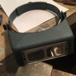 OptiVisor head-mounted magnifier for detailed diecast car restoration work