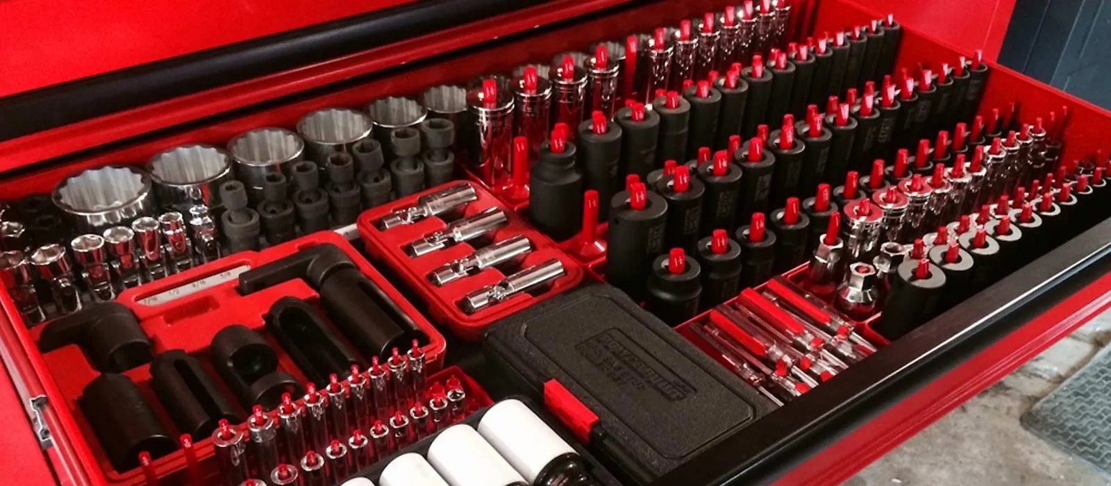 Snap-on starter tools for new car dealership technicians, showcasing a selection of sockets, wrenches, and pliers.